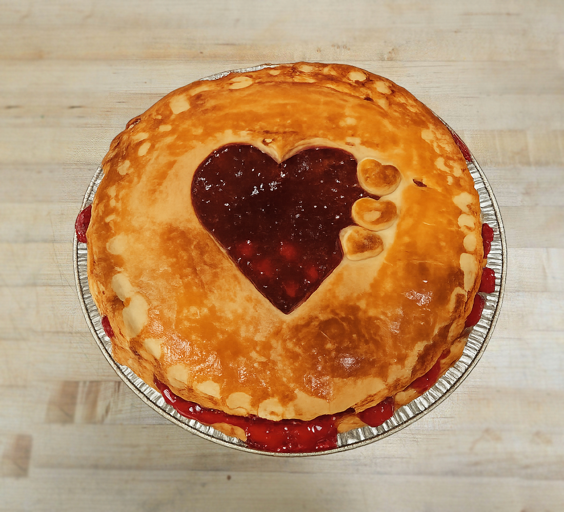 Cherry pie with heart cutout